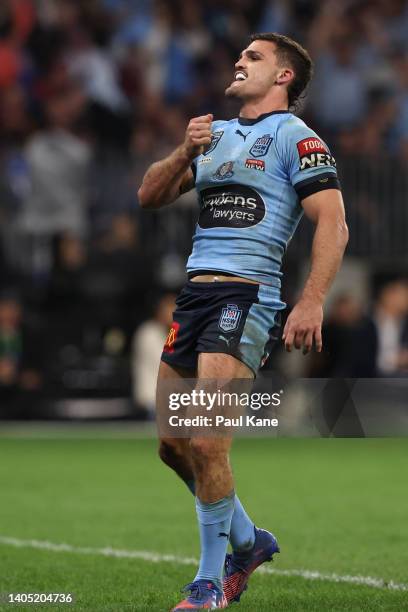 Nathan Cleary of the Blues celebrates scoring a try during game two of the State of Origin series between New South Wales Blues and Queensland...