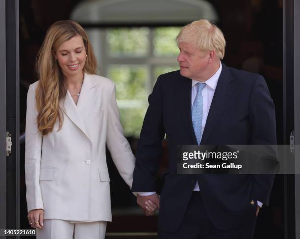 British Prime Minister Boris Johnson and his wife Carrie Johnson attend the first day of the G7 summit on June 26, 2022 near Garmisch-Partenkirchen,...