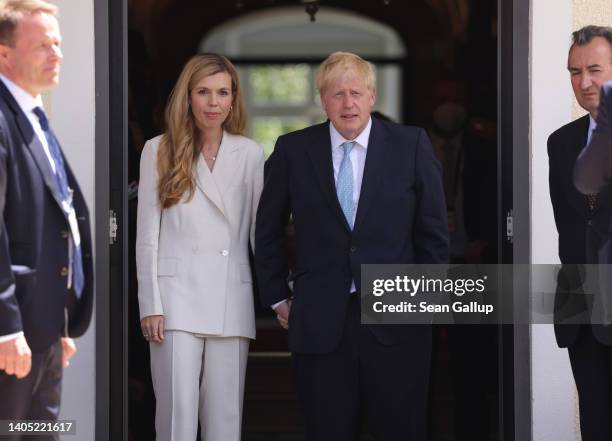 British Prime Minister Boris Johnson and his wife Carrie Johnson attend the first day of the G7 summit on June 26, 2022 near Garmisch-Partenkirchen,...