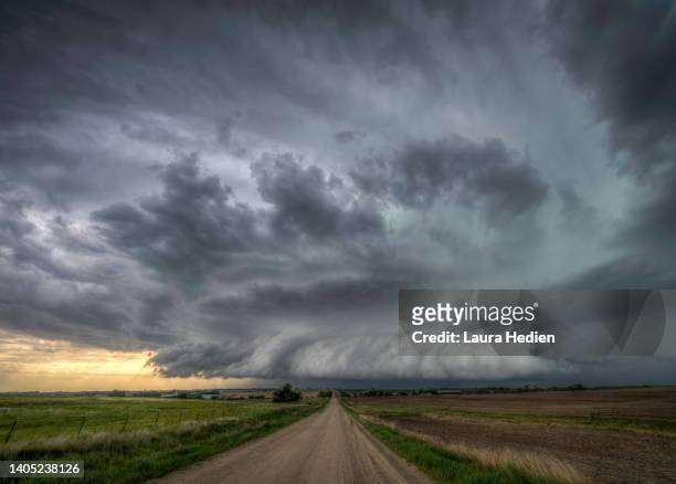 storms across the golden wheat fields on the great plains - prairie stock pictures, royalty-free photos & images
