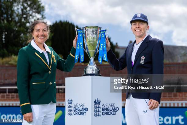 Sune Luus, Captain of South Africa, and Heather Knight, Captain of England, pose for a photograph with the LV= Insurance Test trophy at The Cooper...