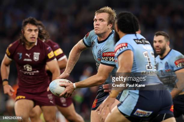Jake Trbojevic looks to pass the ball during game two of the State of Origin series between New South Wales Blues and Queensland Maroons at Optus...