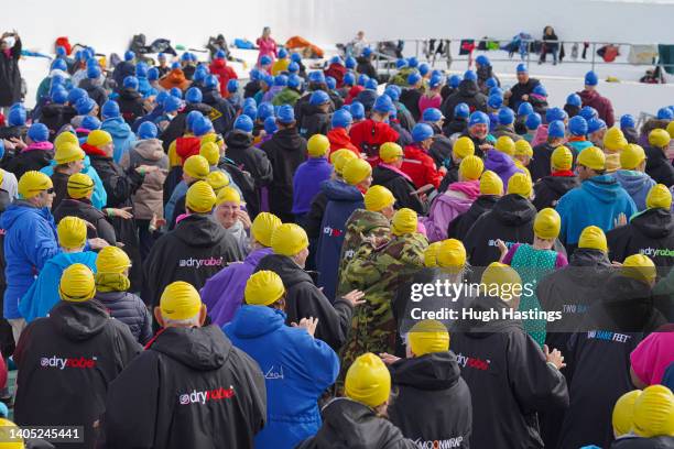 Participants rehearse on land before taking part in a Guinness World Record attempt for the largest number of people performing a synchronised...