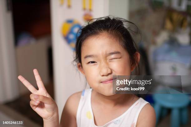 playful little girl - child eyes closed stock pictures, royalty-free photos & images