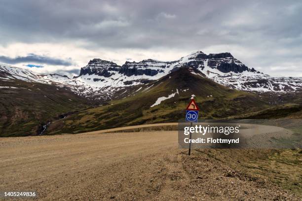 the road (94) from bakkagerdi to egilstadir is not that easy to drive at some sections. but it's a great road with beautiful views. - bakkagerdi stock pictures, royalty-free photos & images