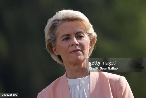 European Union Commission President Ursula von der Leyen listens to colleagues speaking at the "Global Infrastructure“ side event during the G7...