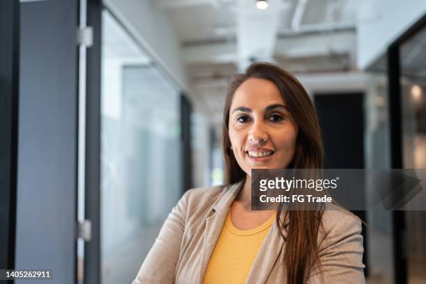 portrait of a businesswoman in the office - female founder stock pictures, royalty-free photos & images
