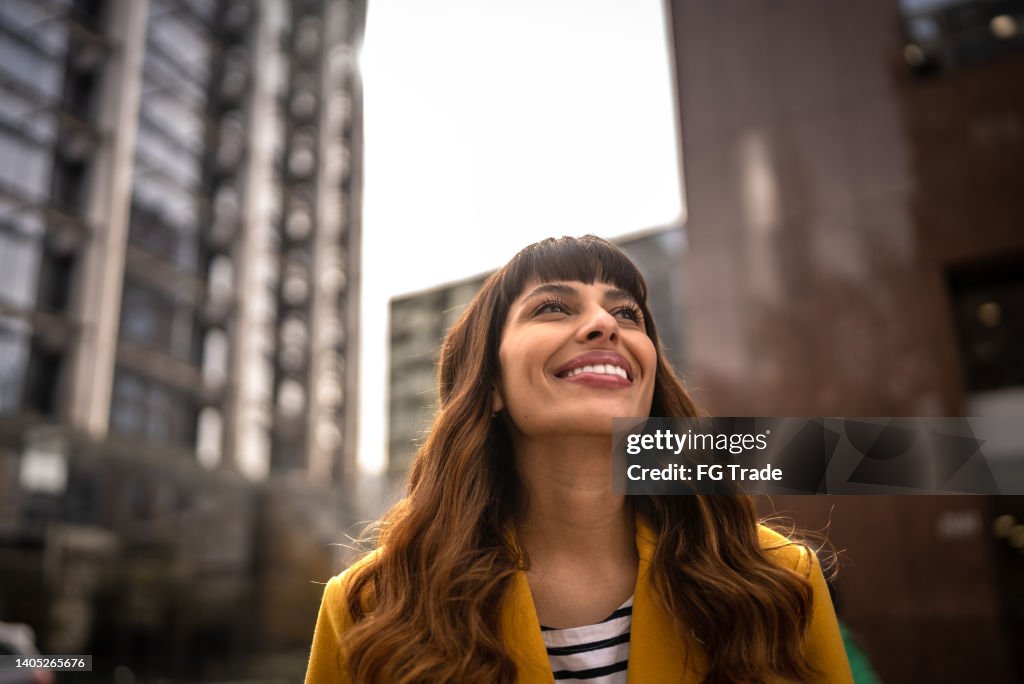 Young woman contemplating outdoors