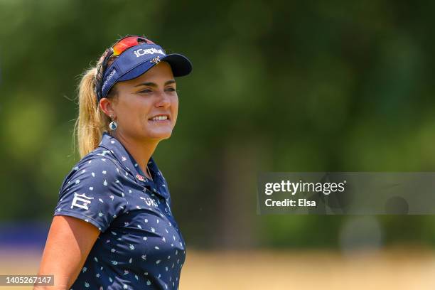 Lexi Thompson of the United States smiles on the ninth tee during the final round of the KPMG Women's PGA Championship at Congressional Country Club...