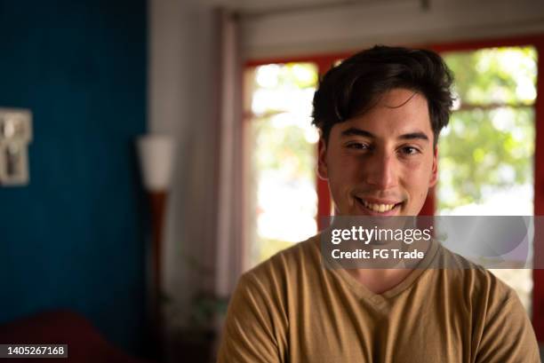 portrait of a young man at home - chilean ethnicity stock pictures, royalty-free photos & images