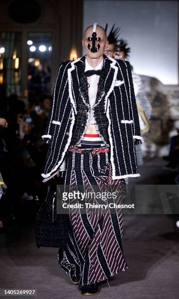 Model walks the runway during the Thom Browne Menswear Spring Summer 2023 show as part of Paris Fashion Week on June 26, 2022 in Paris, France.