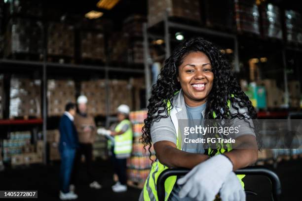 portrait of a warehouse worker - tradesmen stock pictures, royalty-free photos & images