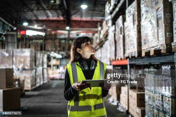warehouse worker taking inventory - freight transportation stock pictures, royalty-free photos & images