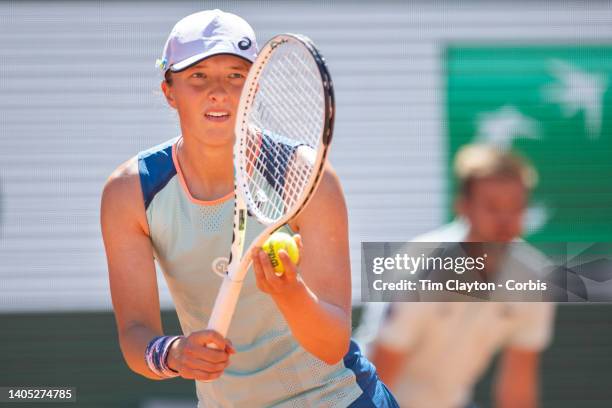 Iga Swiatek of Poland preparing to serve during her match against Jessica Pegula of the United States on Court Philippe Chatrier during the singles...