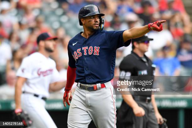 Xander Bogaerts of the Boston Red Sox celebrates scoring on a two-run single by Trevor Story during the sixth inning against the Cleveland Guardians...
