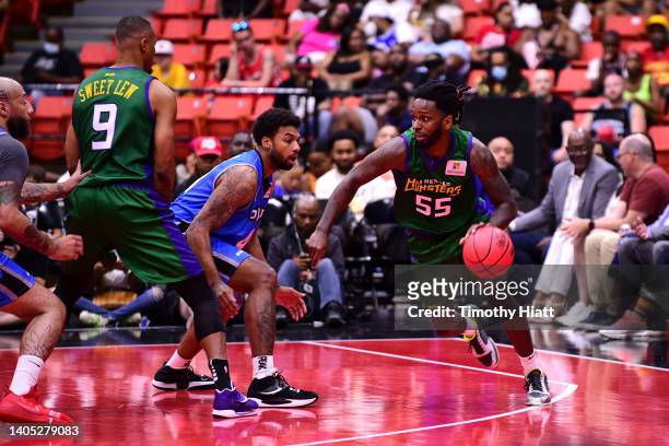 Kevin Murphy of the 3 Headed Monsters dribbles against Glen Rice Jr. #41 of the Power during BIG3 Week Two at Credit Union 1 Arena on June 26, 2022...