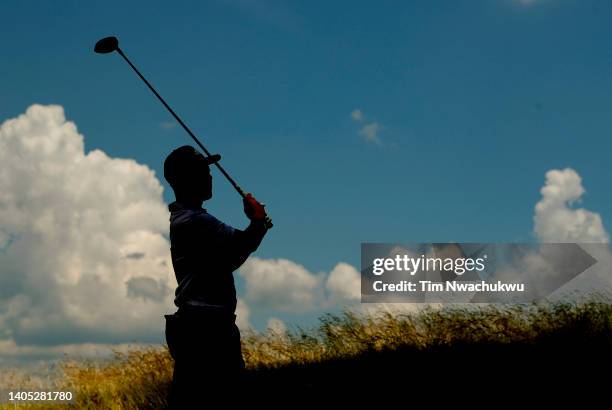 Xander Schauffele of the United States plays his shot from the third tee during the final round of Travelers Championship at TPC River Highlands on...