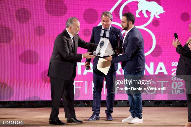 Director Francis Ford Coppola Savoca Mayor Antonino Bartolotta, and a guest are seen on stage during the Taormina Film Fest 2022 Opening Ceremony on...