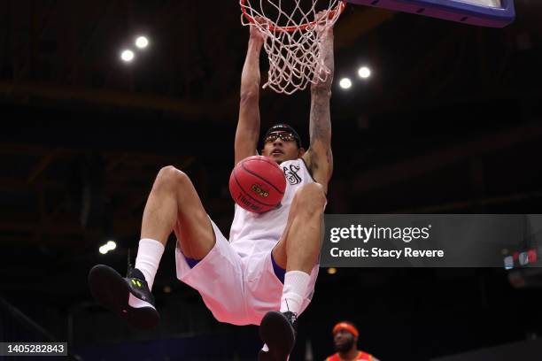 Isaiah Austin of the Enemies dunks against Ike Diogu of Bivouac during BIG3 Week Two at Credit Union 1 Arena on June 26, 2022 in Chicago, Illinois.