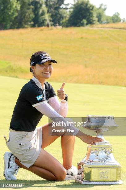 In Gee Chun of South Korea poses with the championship trophy after winning during the final round of the KPMG Women's PGA Championship at...