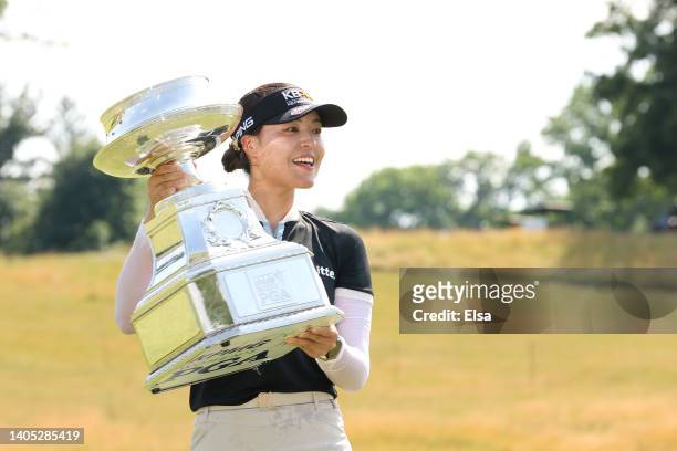In Gee Chun of South Korea poses with the championship trophy after winning during the final round of the KPMG Women's PGA Championship at...