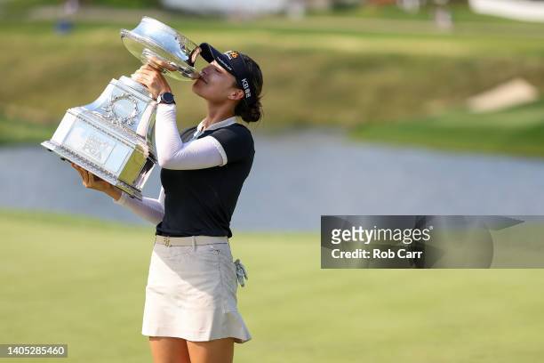 In Gee Chun of South Korea kisses the championship trophy after winning during the final round of the KPMG Women's PGA Championship at Congressional...