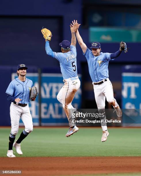 Wander Franco and Brett Phillips of the Tampa Bay Rays celebrate after defeating the Pittsburgh Pirates by a score of 4 to 2 at Tropicana Field on...