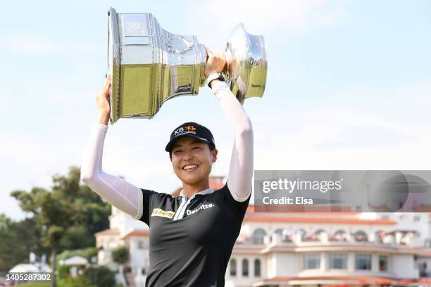 In Gee Chun of South Korea celebrates with the championship trophy after winning during the final round of the KPMG Women's PGA Championship at...