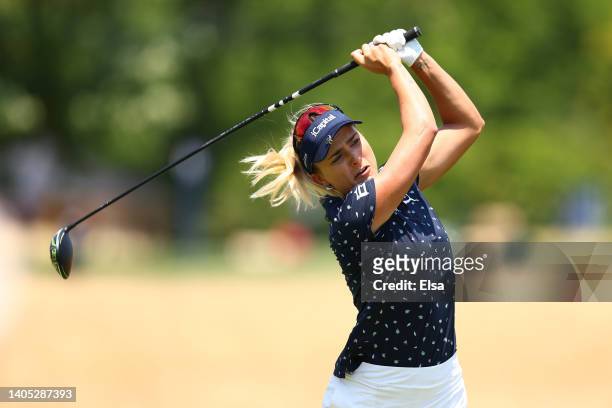 Lexi Thompson of the United States plays a shot during the final round of the KPMG Women's PGA Championship at Congressional Country Club on June 26,...