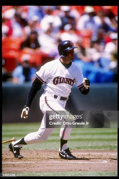 First baseman Will Clark of the San Francisco Giants throws down his bat and prepares to run during a game against the Chicago Cubs. Mandatory...