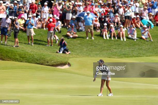 In Gee Chun of South Korea celebrates making her putt for par on the 18th green to win during the final round of the KPMG Women's PGA Championship at...