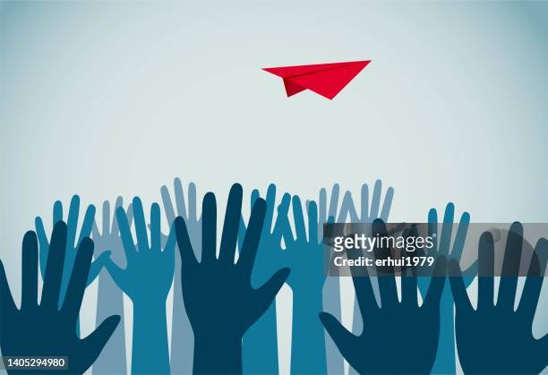a group of people scrambling for paper airplanes in the air - reaching stock illustrations