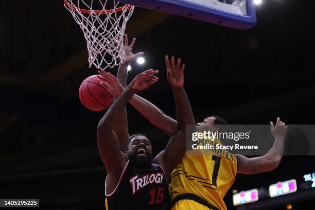 Amir Johnson of the Trilogy reacts as he is blocked by KJ McDaniels of the Killer 3's during BIG3 Week Two at Credit Union 1 Arena on June 26, 2022...