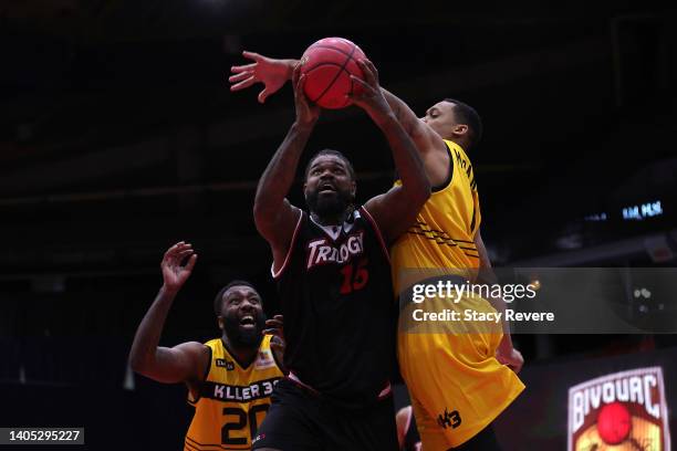 Amir Johnson of the Trilogy reacts as he is blocked by KJ McDaniels of the Killer 3's during BIG3 Week Two at Credit Union 1 Arena on June 26, 2022...