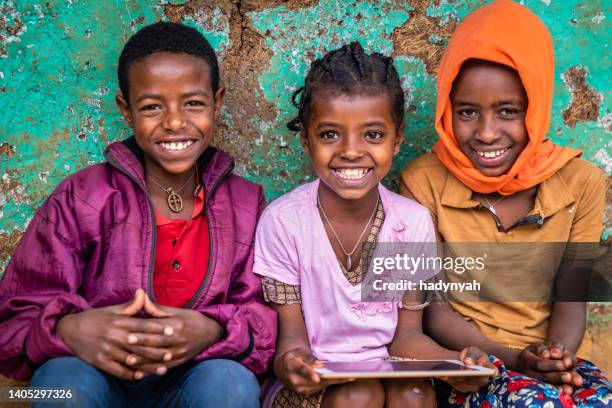 african children using digital tablet, east africa - ethiopia bildbanksfoton och bilder