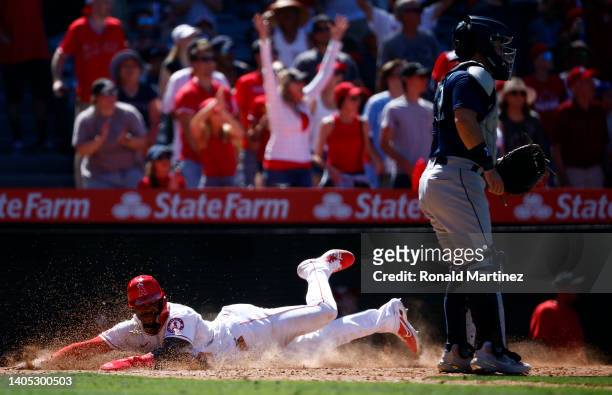 Monte Harrison of the Los Angeles Angels scores a run against the Seattle Mariners in the seventh inning at Angel Stadium of Anaheim on June 26, 2022...