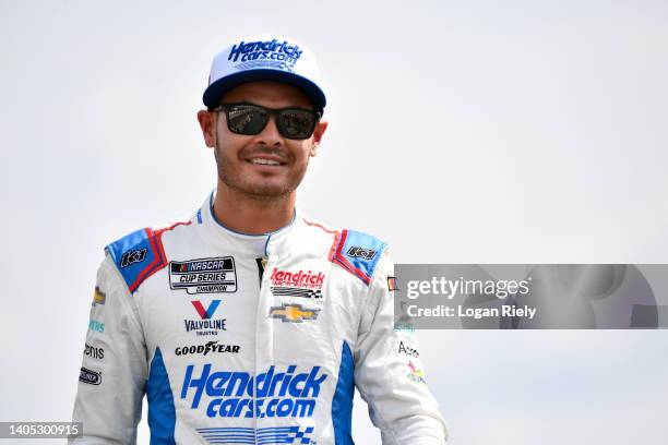 Kyle Larson, driver of the HendrickCars.com Chevrolet, walks onstage during driver intros prior to the NASCAR Cup Series Ally 400 at Nashville...