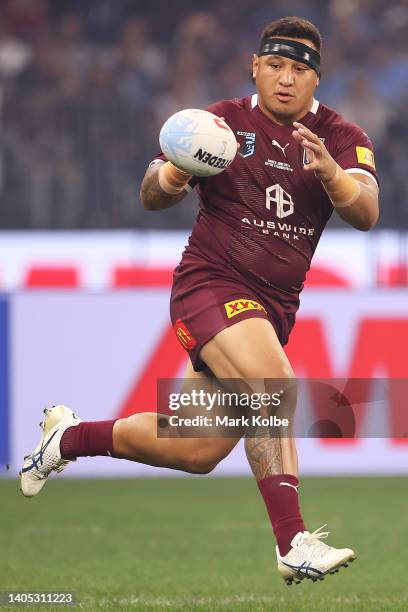 Josh Papalii of the Maroons runs the ball during game two of the State of Origin series between New South Wales Blues and Queensland Maroons at Optus...