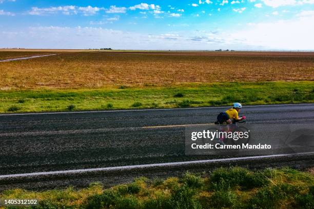 An age group athlete competes in IRONMAN 70.2 on June 26, 2022 in Lubbock, Texas.