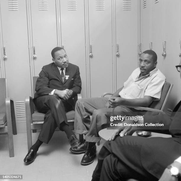 Reverend Dr Martin Luther King visits comedian and civil rights activist Dick Gregory in jail after his arrest during a protest against Chicago...