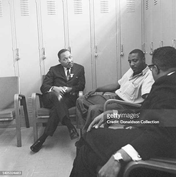 Reverend Dr Martin Luther King and lawyer Chauncey Eskridge visit comedian and civil rights activist Dick Gregory in jail after his arrest during a...