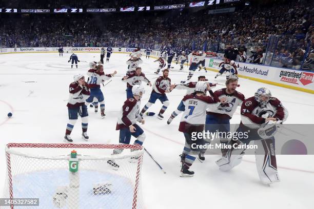 Colorado Avalanche players celebrate after defeating the Tampa Bay Lightning 2-1 in Game Six of the 2022 NHL Stanley Cup Final at Amalie Arena on...
