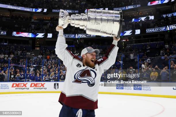 Gabriel Landeskog of the Colorado Avalanche lifts the Stanley Cup after defeating the Tampa Bay Lightning 2-1 in Game Six of the 2022 NHL Stanley Cup...