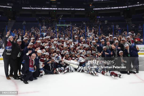 Colorado Avalanche coaches and players pose for a photo after defeating the Tampa Bay Lightning 2-1 in Game Six of the 2022 NHL Stanley Cup Final at...