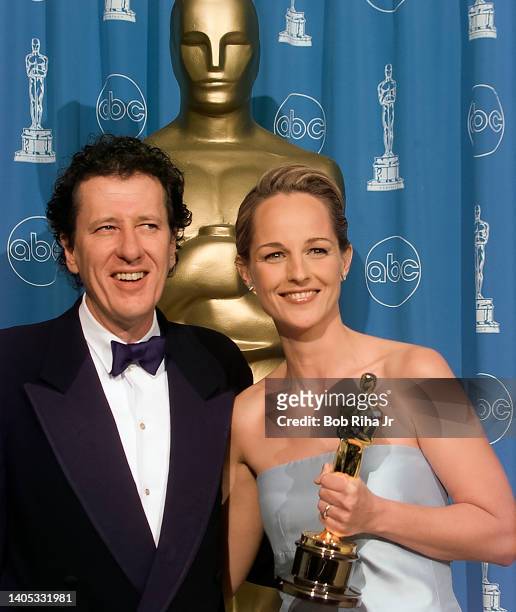 Oscar Winners Helen Hunt and Geoffrey Rush backstage at Academy Awards Show, March 23, 1998 in Los Angeles, California.
