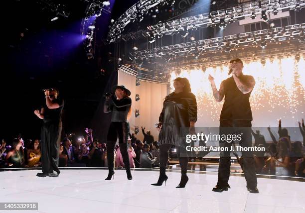 Faith Evans and Chandler Moore, Naomi Raine, and Brandon Lake of Maverick City Music perform onstage during the 2022 BET Awards at Microsoft Theater...