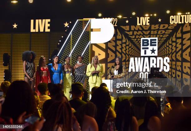 Smith, Crystal Renne Hayslett, Ebony Obsidian, Novi Brown, and Mignon present the Youngsters Award to Marsai Martin onstage during the 2022 BET...