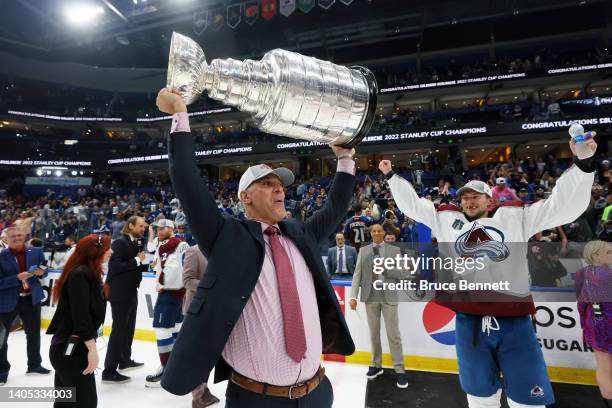 Head coach Jared Bednar of the Colorado Avalanche lifts the Stanley Cup after defeating the Tampa Bay Lightning 2-1 in Game Six of the 2022 NHL...