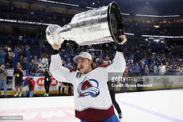 Nicolas Aube-Kubel of the Colorado Avalanche lifts the Stanley Cup after defeating the Tampa Bay Lightning 2-1 in Game Six of the 2022 NHL Stanley...