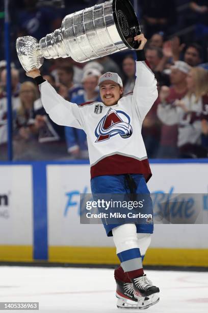 Nicolas Aube-Kubel of the Colorado Avalanche lifts the Stanley Cup after defeating the Tampa Bay Lightning 2-1 in Game Six of the 2022 NHL Stanley...